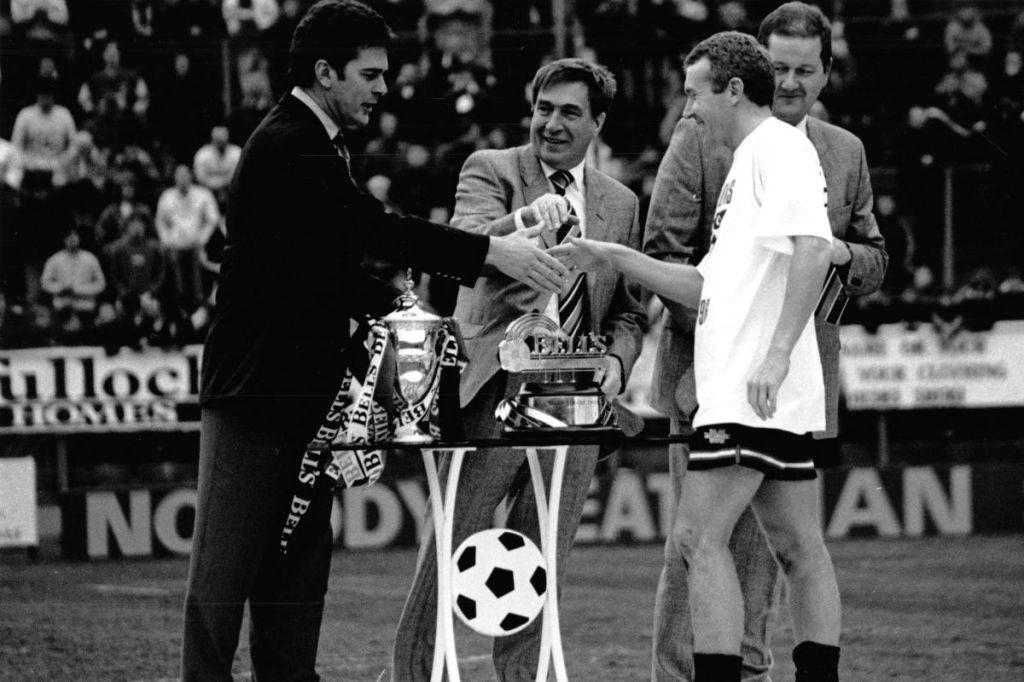 Dunfermline captain Craig Robertson is presented with the First Division trophy. PIC: Dunfermline FC